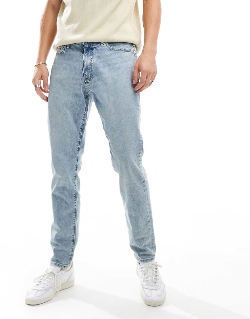 Abercrombie & Fitch Althletic Slim Jeans In Light Wash Blue